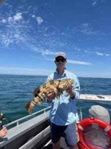 Harry with a huge cod caught while fishing near Monkey Mia, Shark Bay, Western Australia.