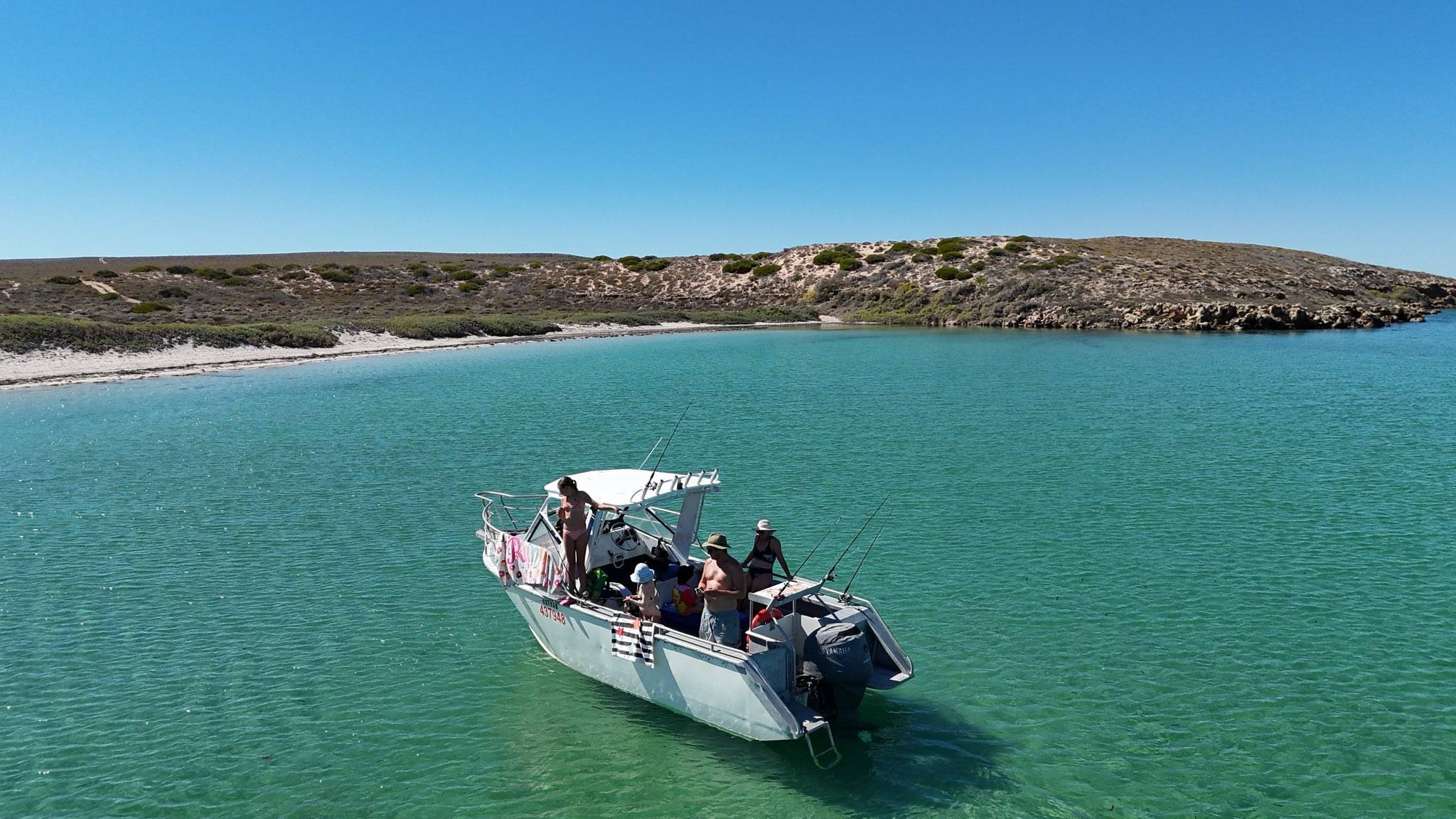 Family enjoying a day on the water with fishing boat hire Monkey Mia