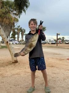 Fletcher with cod – Monkey Mia Boat Hire Shark Bay