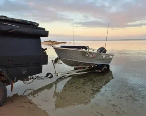 Monkey Mia Boat Hire vessel anchored near Denham beach